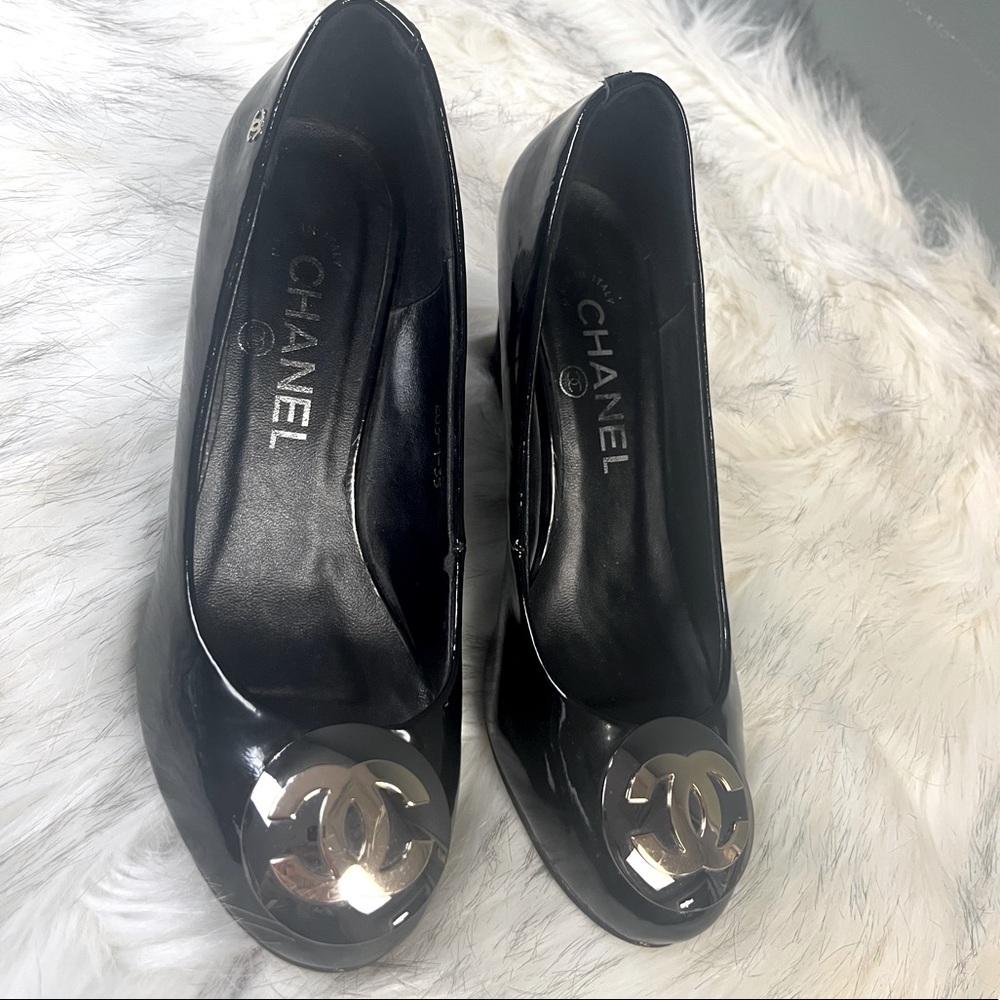 CHANEL Black Patent Leather Wedge Pumps with Silver CC Logo
